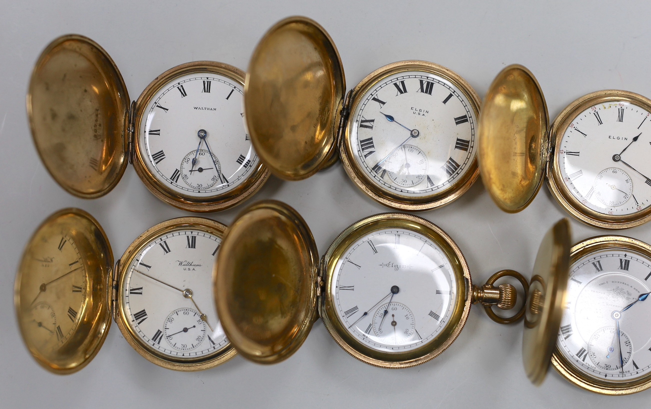 Nine assorted mainly late 19th/early 20th century gold plated hunter pocket watches including four Elgin, two Thomas Russell, two Waltham and one Rockford.